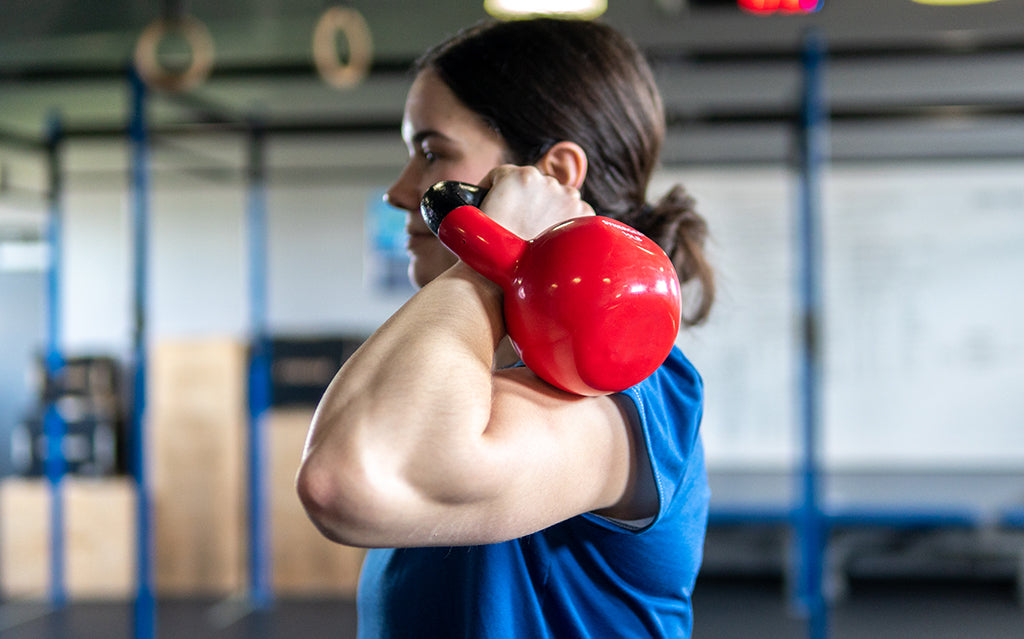 Synergee Vinyl Coated Cast Iron Red Kettlebells at Rest