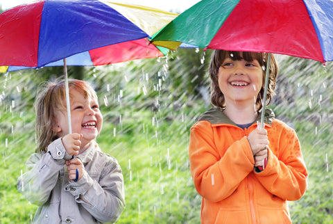 kids enjoying the rain