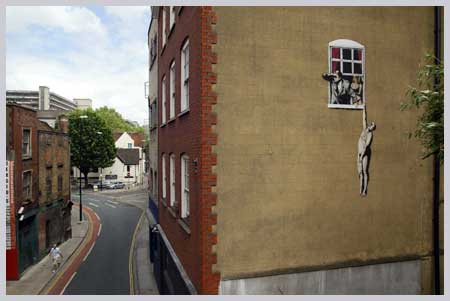 Banksy Man Hanging From Window - Park Street Bristol