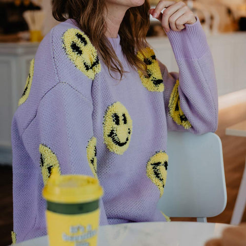 https://cdn.shopify.com/s/files/1/1003/9114/products/knit-sweater-happy-face-light-purple-round-neck_large.jpg?v=1693580408