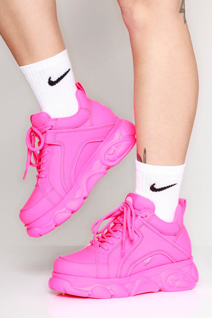 neon pink tennis shoes