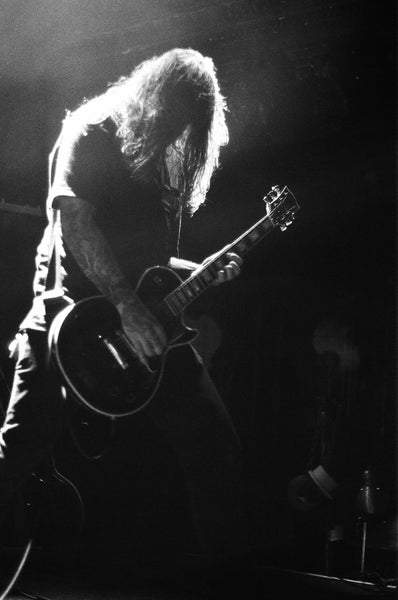 black and white photo of Amenra guitarist by Benedetto Manzella