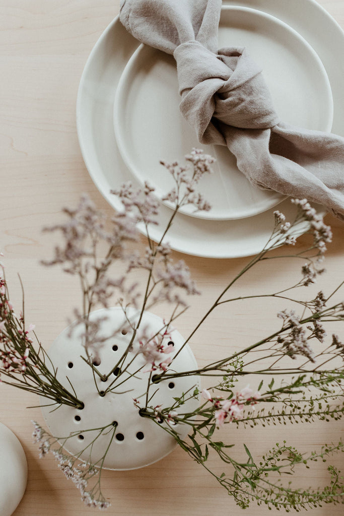 A handthrown and unique ceramic flower frog to dress up your table