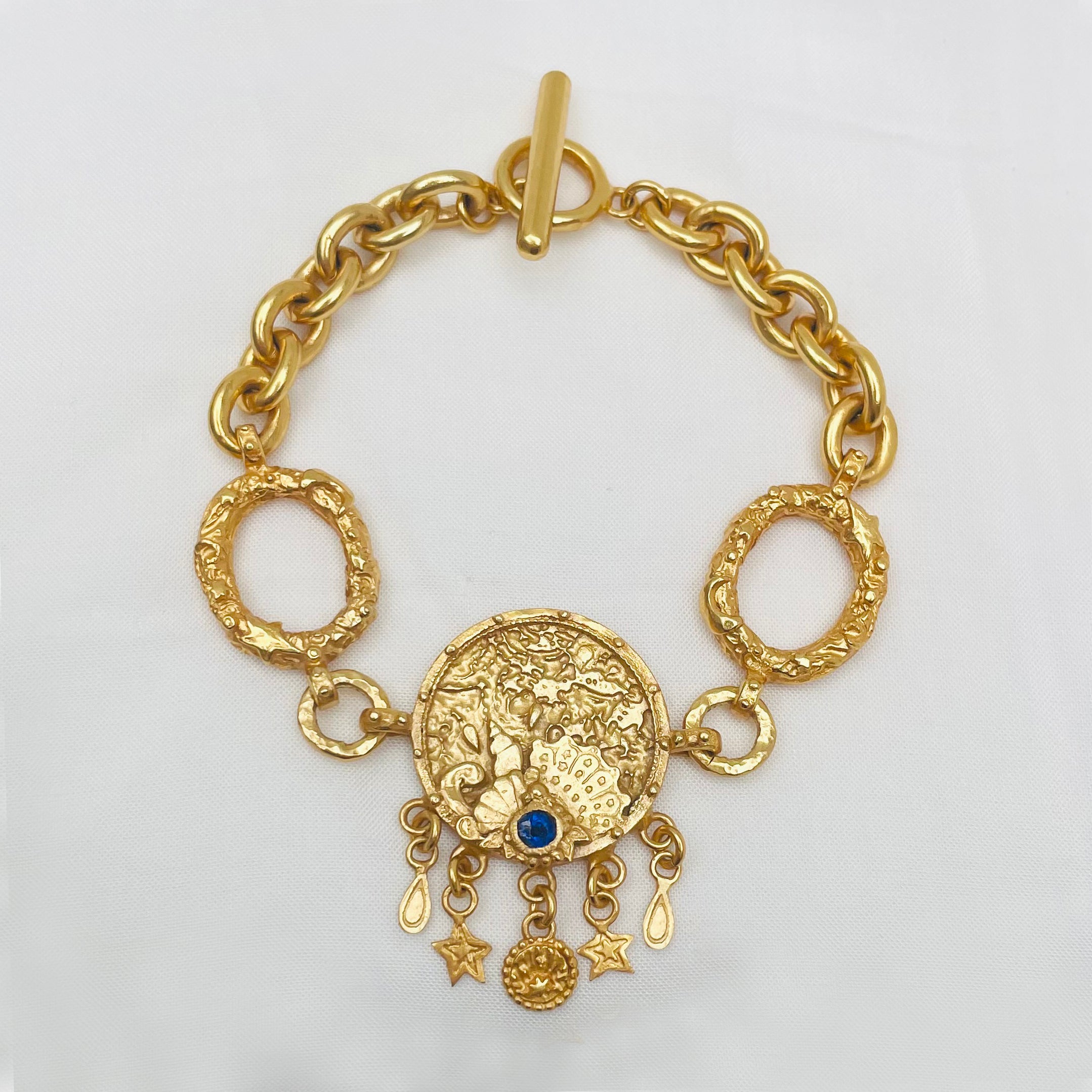 Gold coin store bracelet