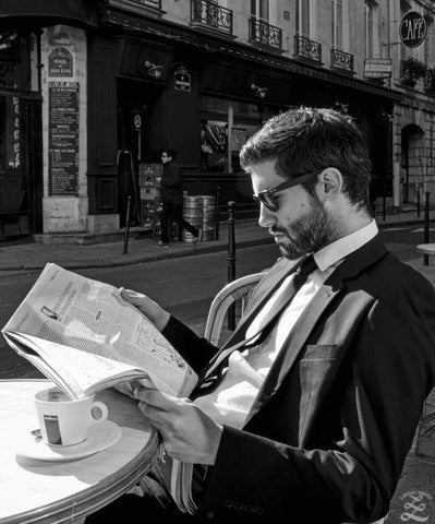 bearded man in suit