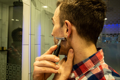 man shaving using Milkman Grooming Co Razors