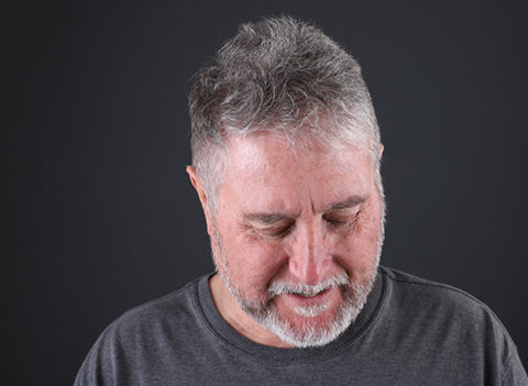 man with stubble grown out in the second phase of growing his beard