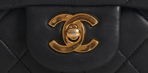 Real Chanel Bag logo. The right C always overlap on top and the left C always overlaps on the bottom