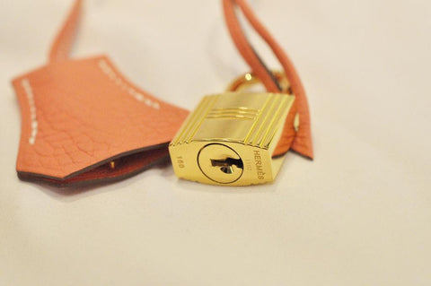 authentic hermes lock and key