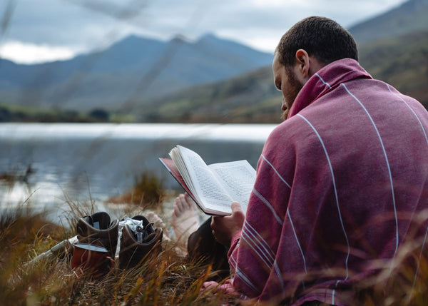 Reading after a mountain tarn swim