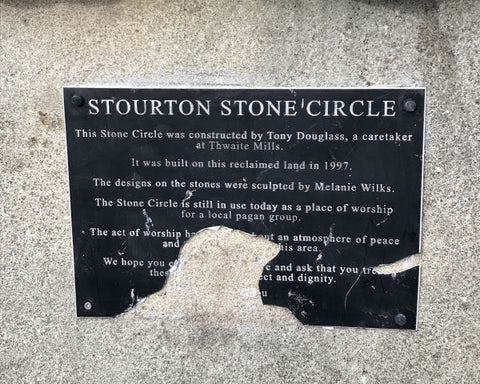 plaque on stone circle