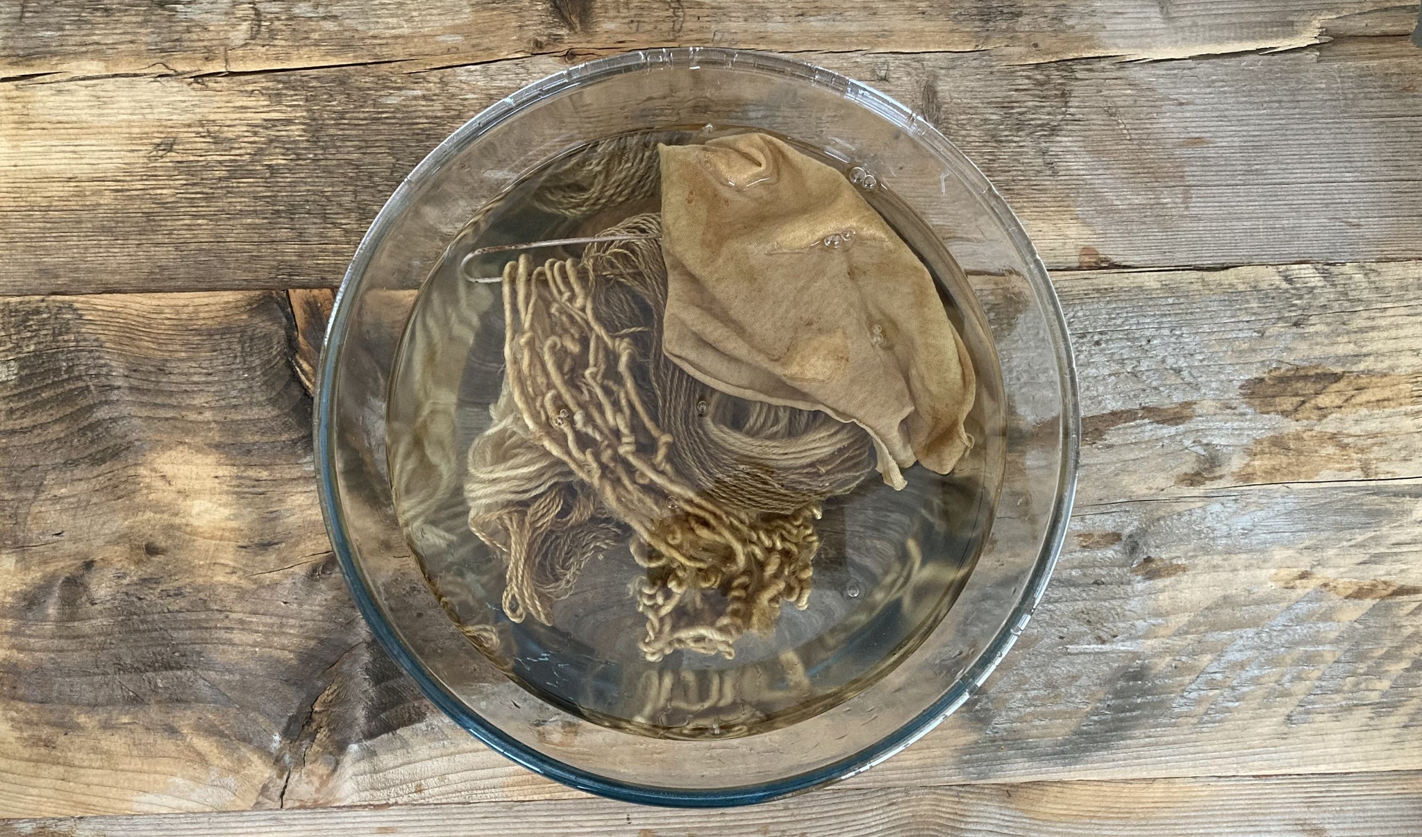 Washed fibres in final bowl of rinsing water