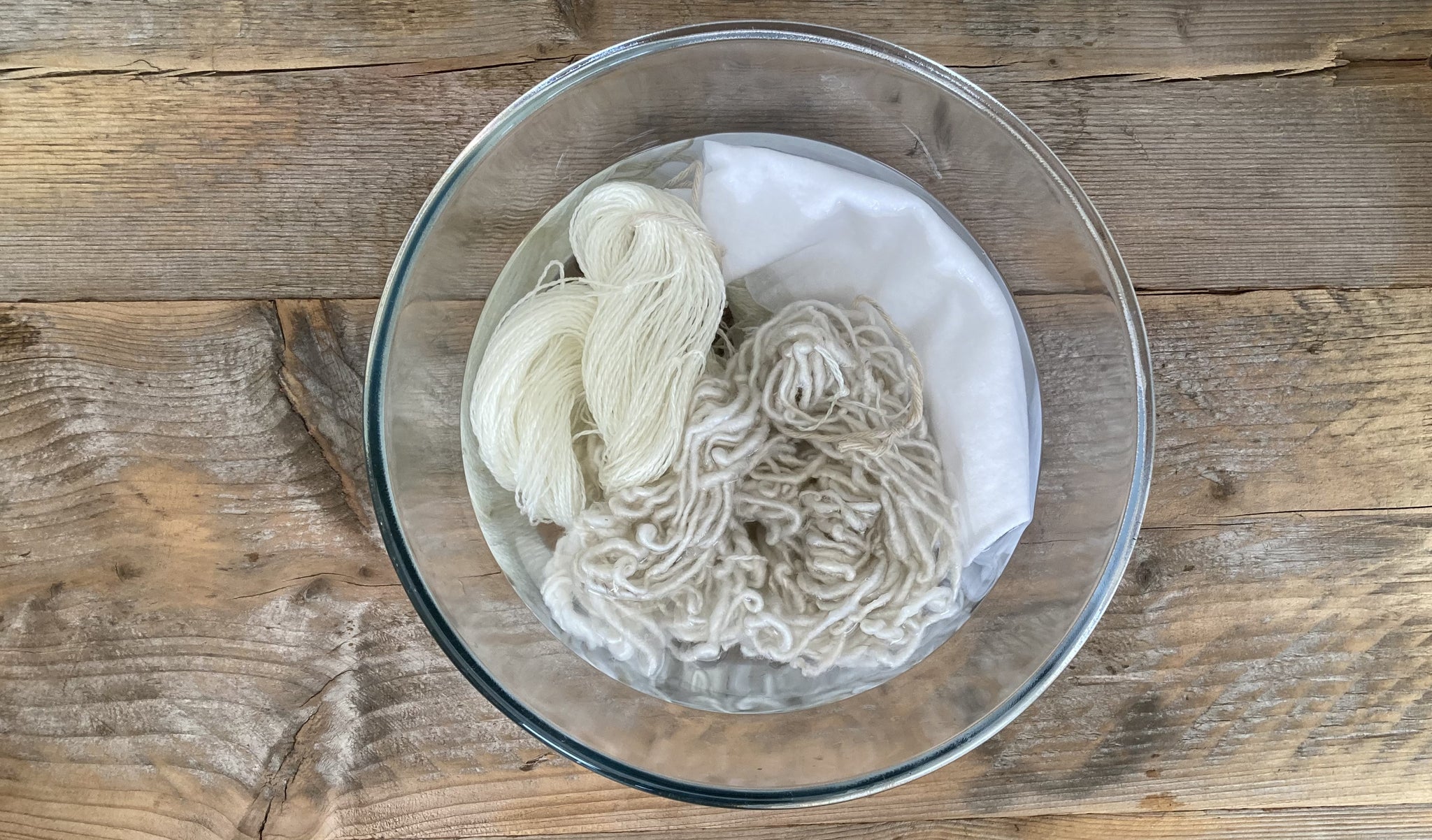 Raw fibres soaking, or 'wetting out'