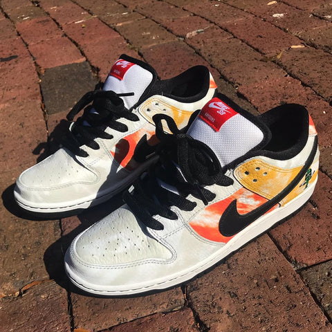 The Nike SB Dunk Low Pro QS White/Black-Orange Flash “Home” Rayguns