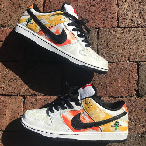 The Nike SB Dunk Low Pro QS White/Black-Orange Flash “Home” Rayguns