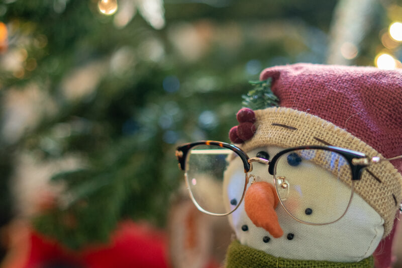 Hiro blue light blocking glasses on snowman