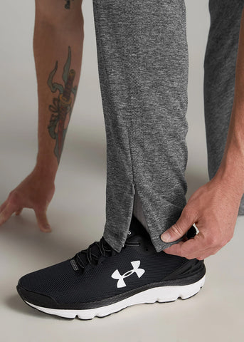 Closeup of zippered ankle opening on men's tall performance pants