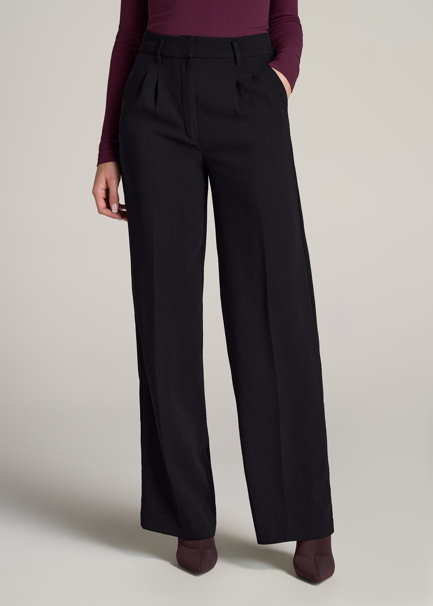 https://cdn.shopify.com/s/files/1/1008/6090/products/American-Tall-Women-Pleated-Dress-Pants-Black-front.jpg?v=1666363783