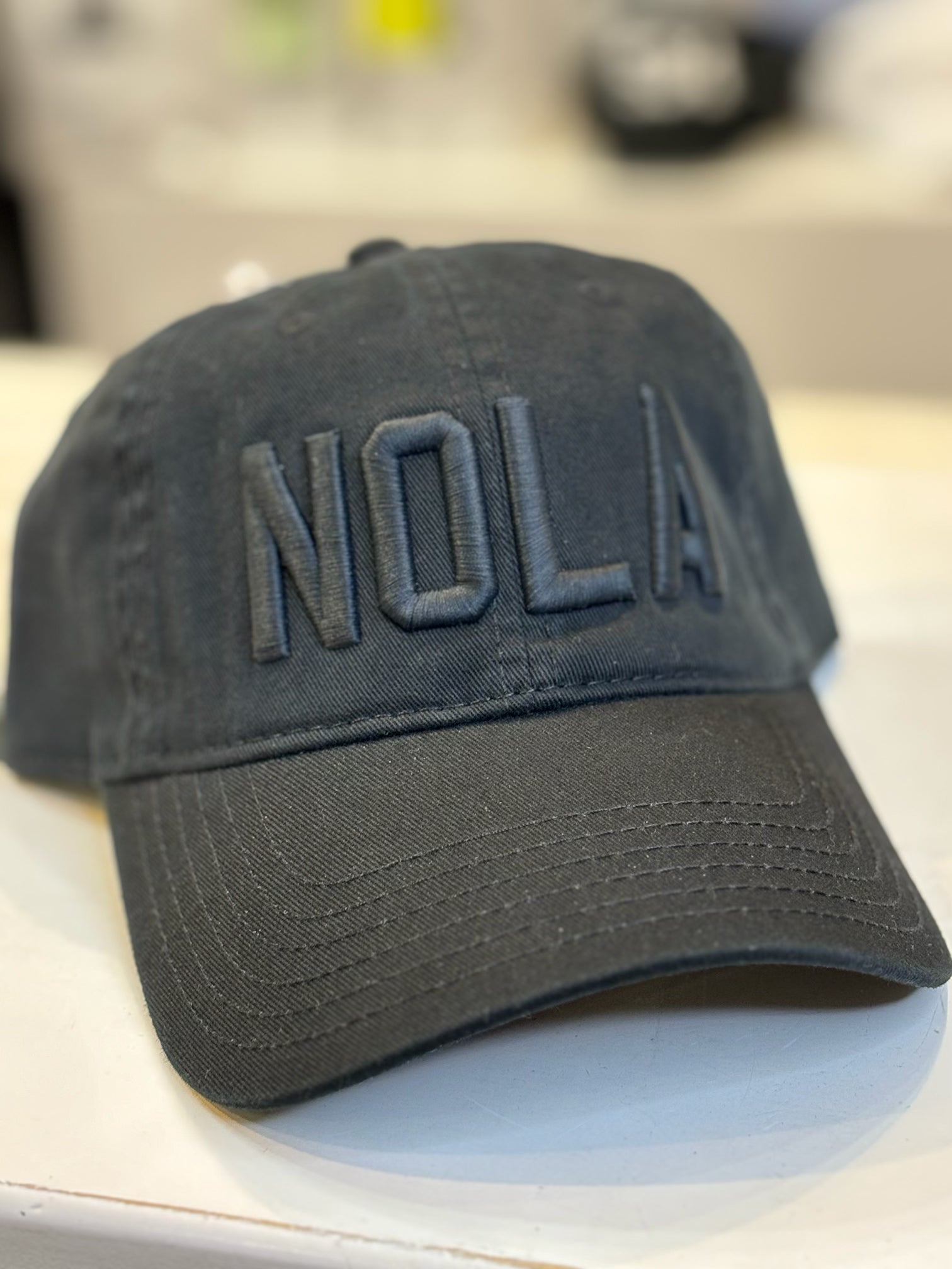 NOLA Black on Black Trucker Hat