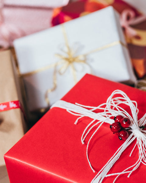 Assortment of packages wrapped for Christmas