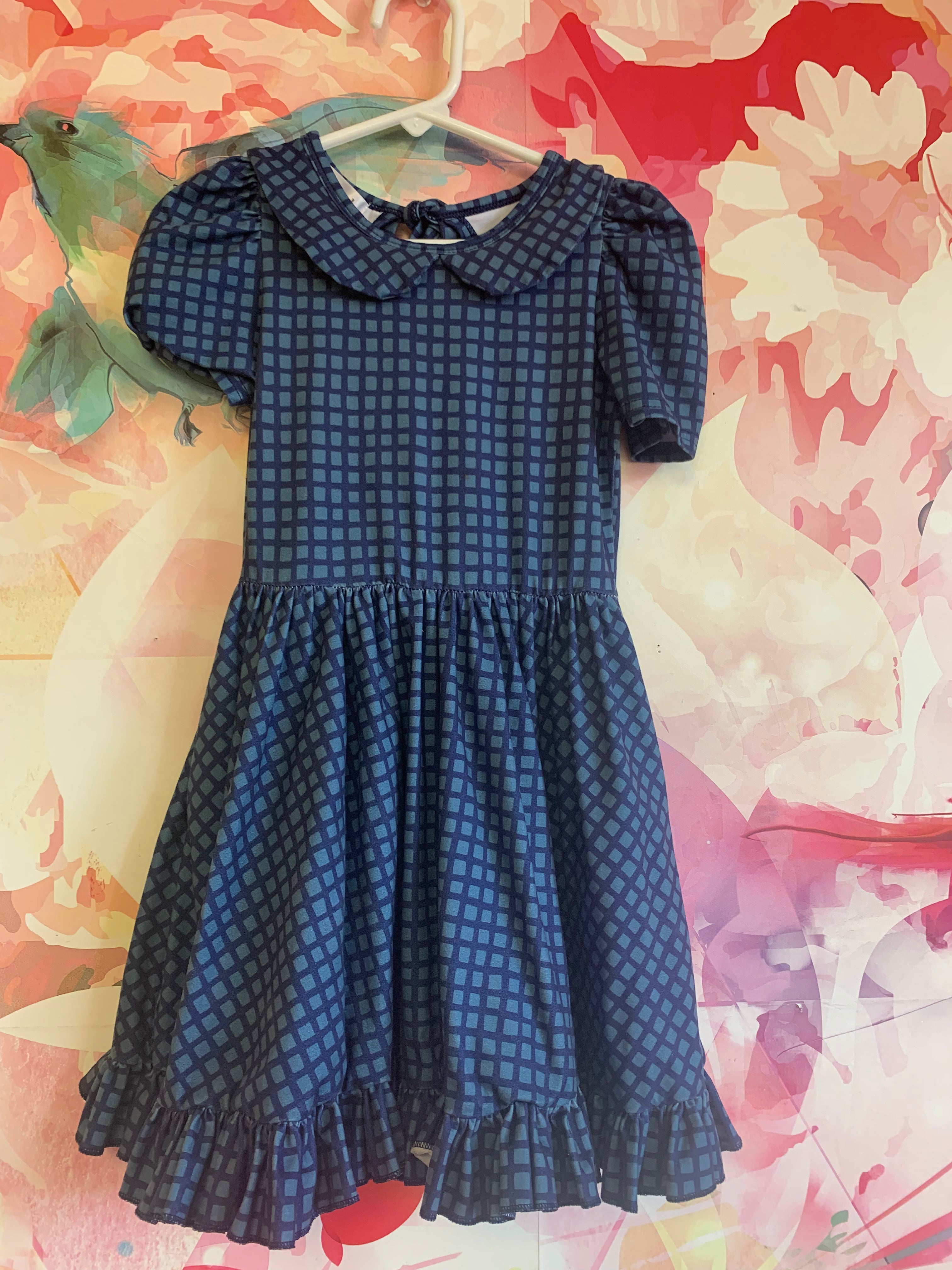 girlhood blue short sleeve dress with Peter pan collar & full skirt. Keyhole tie at back or neck. Size 4T / 5T