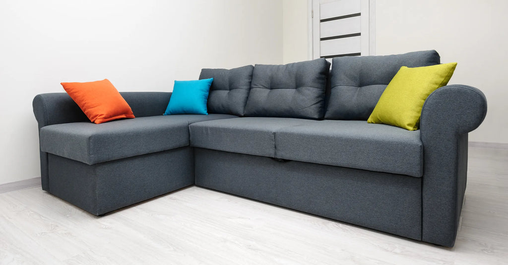 Gray sofa with throw pillows
