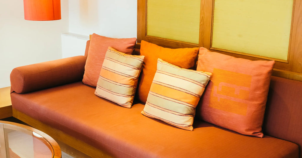 Pillow on brown leather sofa decoration