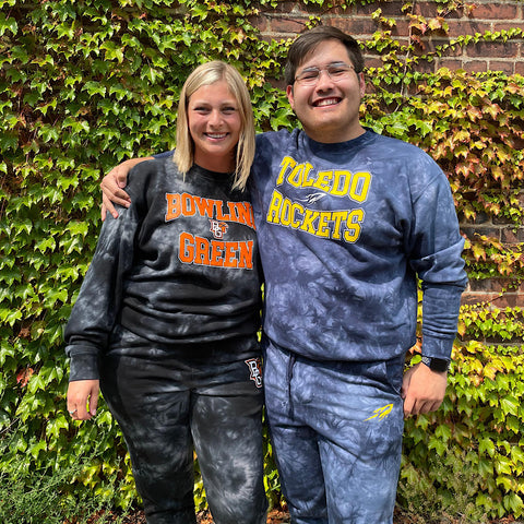 chelsea and danny modeling UToledo and BGSU sweatsuits