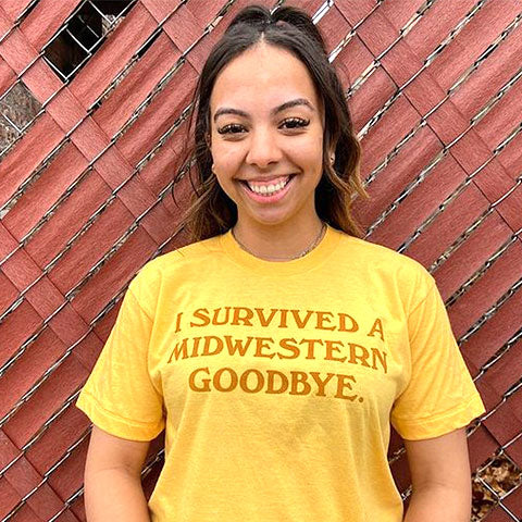 model with a yellow printed Jupmode t-shirt