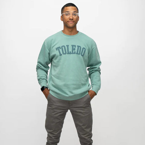 man wearing Toledo Puff Crew Sweatshirt