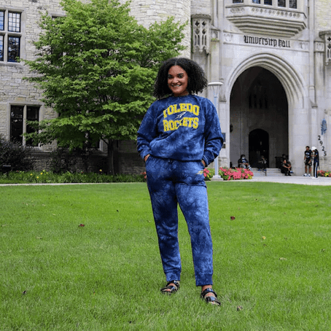 woman wearing tie-dye 16153 Genova Rockets sweatsuit