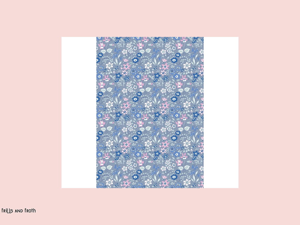 Liberty fabric 'Silver Bells' quilting fabric in blue & pink Liberty 'Silver Bells' fabric from the 'Deco Dance' collection features a blue & pink floral design.