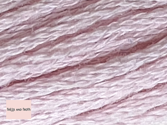 Close up picture of Duchess Embroidery Thread Colour 201 201 Baby Pink 6 strand 100% cotton Embroidery thread 8mtr skein. A delicate light pink coloured embroidery thread.