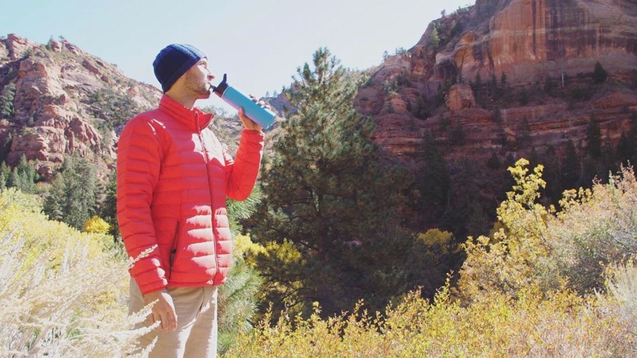 Drinking with the Clearly Filtered Water Bottle
