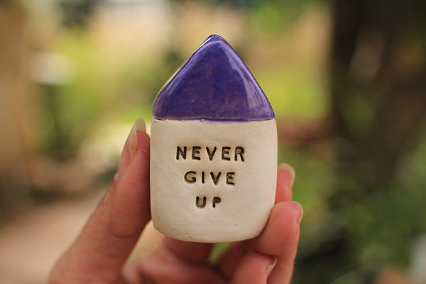 Miniature house Motivational quotes Inspirational quote Never give up