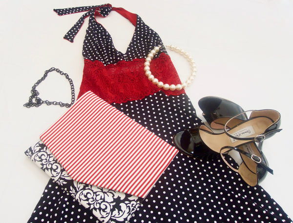 Black and white polka dot tango dress with lace waist and halter neck tie.