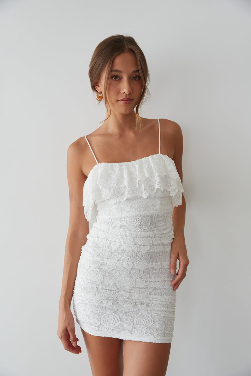 white lace bodycon dress - graduation dress inspo - ruffle bust lace mini dress