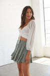 Flowy shorts with a drawstring tie and an elastic waistband. 