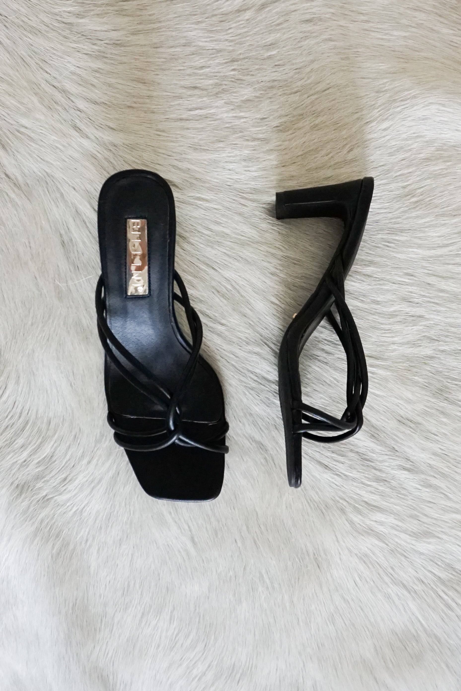 Kora Twisted Strap Heel in Black