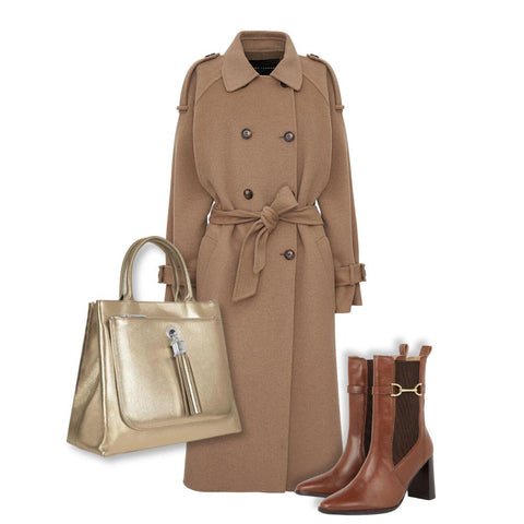 A complete look with trench coat, brown boot and metallic Dahlia handbag