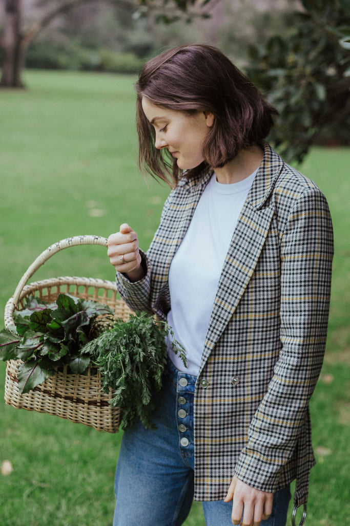 Woman with a basket of produce