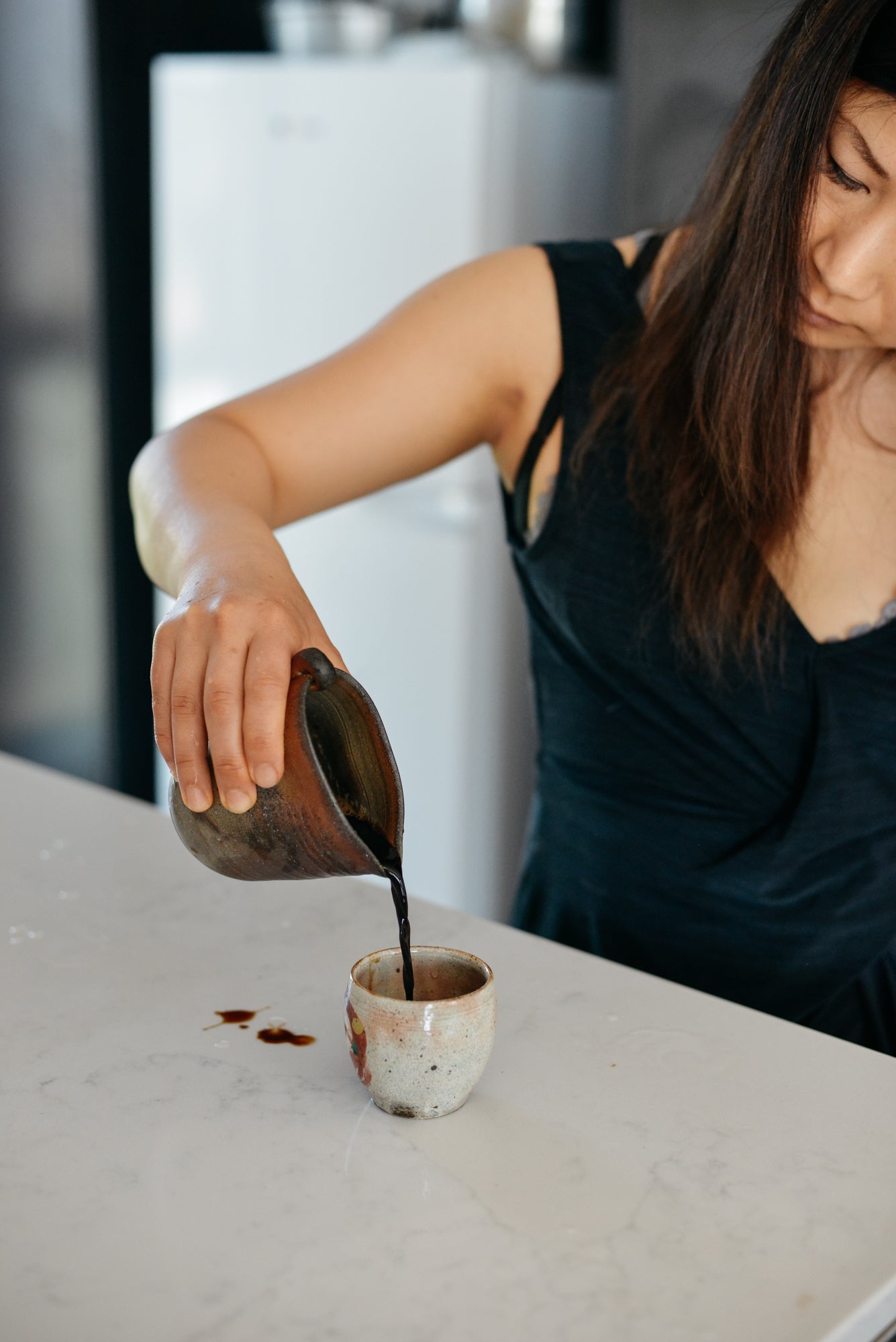 Woman pouring coffee