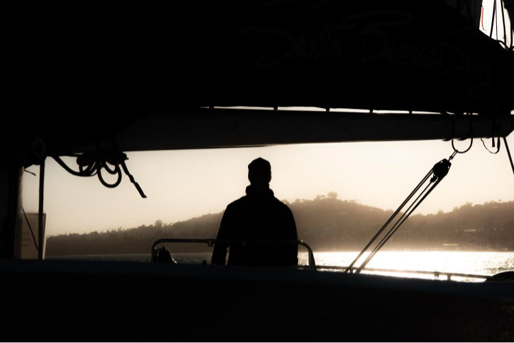 Shadow of human on boat