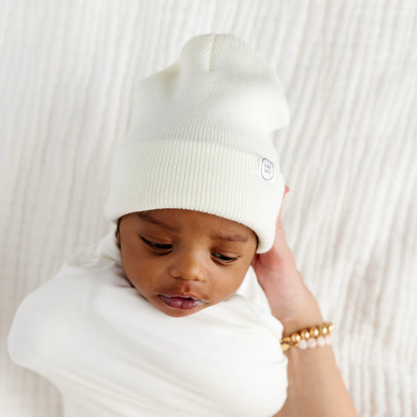 Ivory LV Upcycled Pom Hat — TREND NY