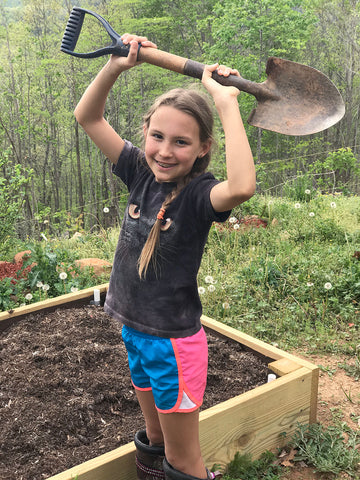 Sofia Holding a Shovel