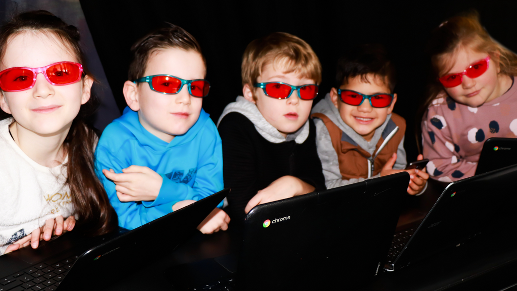 kids wearing blue blocking glasses