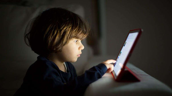 kids looking at screen blue light blocking glasses