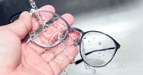 cleaning glasses with water