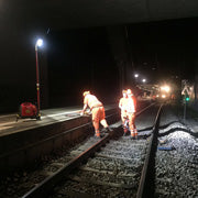 Portable LED worklight illuminates railway maintenance crew