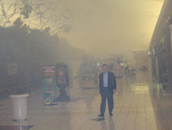 Mall developer, very pleased, watches smoke exit the mall without an expensive smoke removal system!